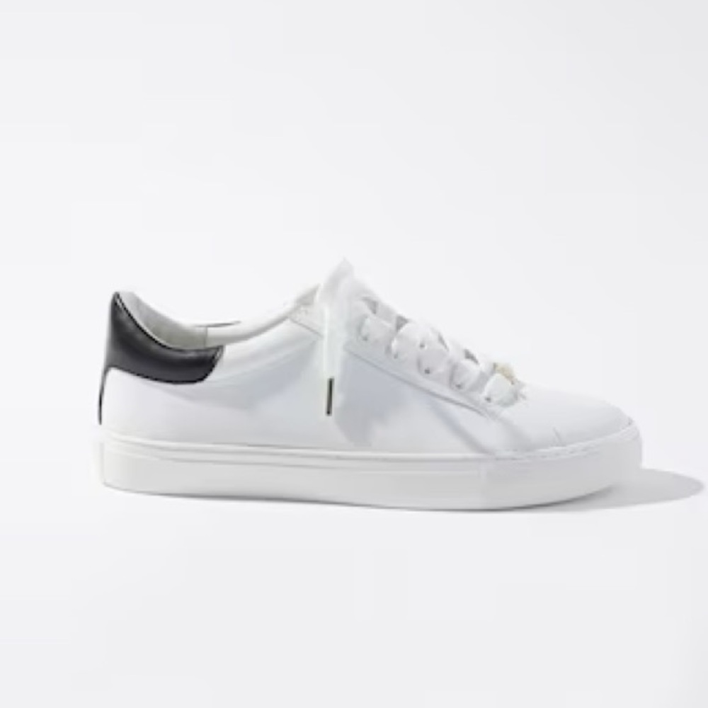 New in box. Leather White House Black Market White and Black sneakers. Sz 8.5